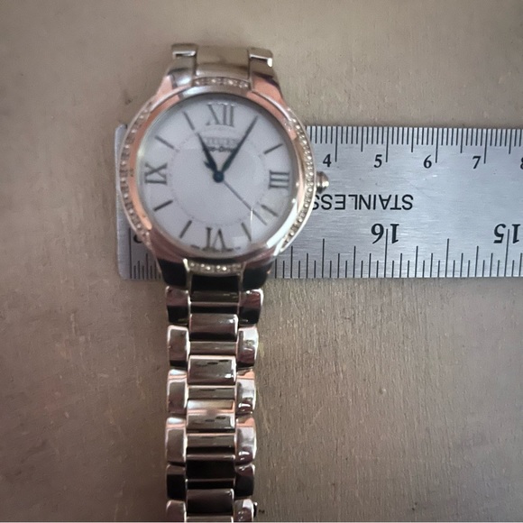 CITIZEN ECODRIVE SILVER TONE BRACET WATCH W/ TINY DIAMOND CHIP ACCENTS. - Picture 11 of 16